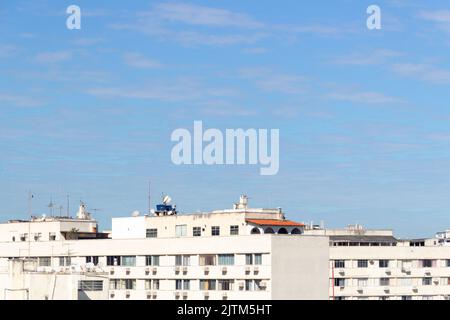 buildings in the copacabana neighborhood with a beautiful blue sky with clouds in Rio de Janeiro - Brazil Stock Photo