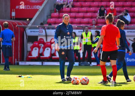 Sunderland Women head coach Melanie Reay oversees the warm up before her side take on Birmingham City Women at the Stadium of Light. Stock Photo