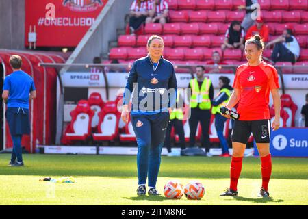 Sunderland Women head coach Melanie Reay oversees the warm up before her side take on Birmingham City Women at the Stadium of Light. Stock Photo