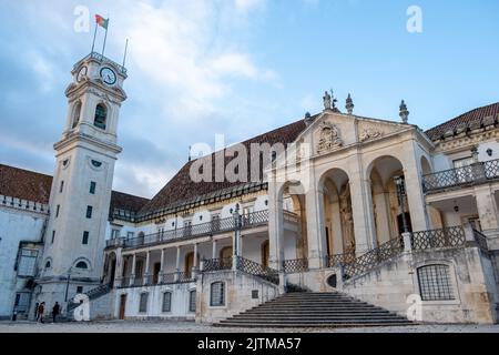 Facade of the Faculty of Law 'Faculdade de Direito' and the Clock Tower at the Campus of the University of Coimbra. Stock Photo