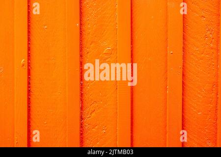 Background orange wall made of painted wooden planks Stock Photo