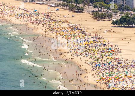 Copacabana beach full on a typical sunny Sunday in Rio de Janeiro ...