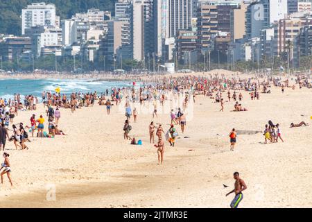 ipanema beach in Rio de Janeiro, Brazil - August 15, 2020: person enjoying the ipanema beach in rio de janeiro. Stock Photo