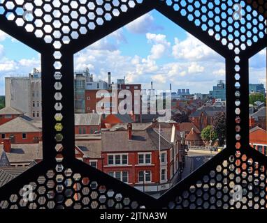 Warrington from Time Square car park, hexagon car park decoration, showing view west towards Fiddlers Ferry coal  fuelled power station Stock Photo