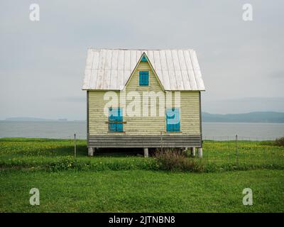 An old house with view of the sea in Gaspé, Gaspé, Quebec, Canada Stock Photo