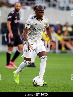 Columbus Crew midfielder Darlington Nagbe (6) holds the trophy as he ...