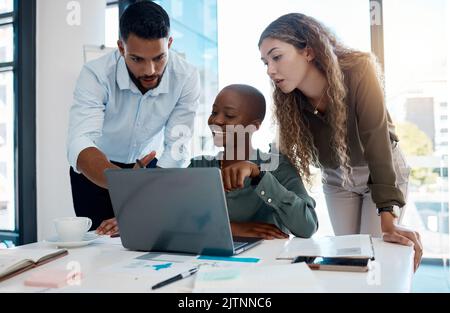 Vision leadership, innovation and teamwork of a business team in office work meeting working on laptop. Diversity, corporate and finance managers Stock Photo