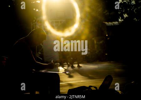 Strange effects from camera lenses create sunlight. Light pants surrounding people or objects are the technology of ancient len cametra Stock Photo