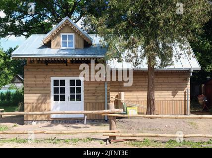 Unfinished rustic barn made from pine  planks Stock Photo