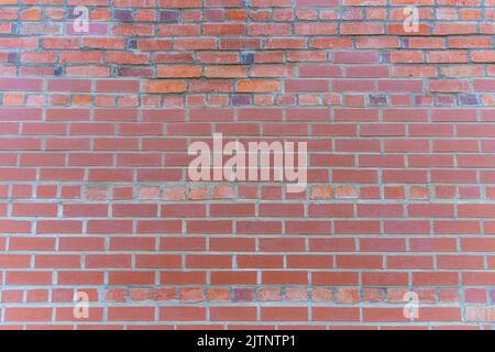 Vintage Brick wall in city downtown - Background concept Stock Photo