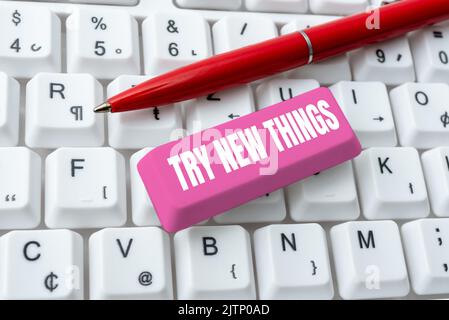 Sign displaying Try New Things, Business approach Do different activities get to know other ways of doing Businessman in suit holding notepad symboliz Stock Photo