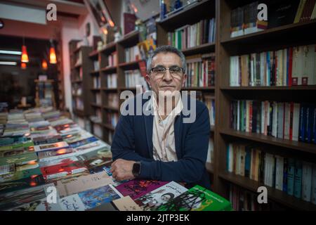 Berlin, Germany. 08th Feb, 2019. Abbas Maroufi, Iranian author, stands in his Berlin bookstore. The exiled writer has died at the age of 65. Credit: Arne Bänsch/dpa/Alamy Live News Stock Photo