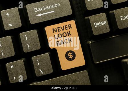 Sign displaying Never Look Back, Business showcase Do not have regrets for your actions be optimistic Piece Of Cardboard On Floor With Important Infor Stock Photo