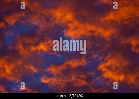 beautiful skies in the evening; fire background with clouds; fire in the sky; Autumn days; Autumn tone and textures; autumn colours; sky during autumn Stock Photo
