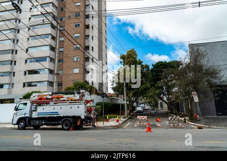 Tree branch stuck on electrical wires after a heavy storm. Stock Photo