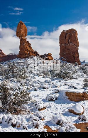 Balanced Rock after a winter snowfall in Arches National Park, Moab, Utah. Stock Photo