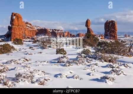 Balanced Rock after a winter snowfall in Arches National Park, Moab, Utah. Stock Photo