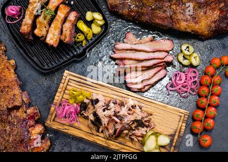 smoked meat assortment beef brisket pulled pork Stock Photo