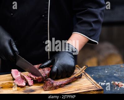 steakhouse kitchen cowboy steak chef beef meat Stock Photo