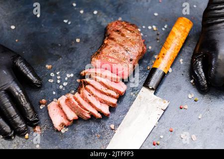 steakhouse food striploin steak beef meat knife Stock Photo