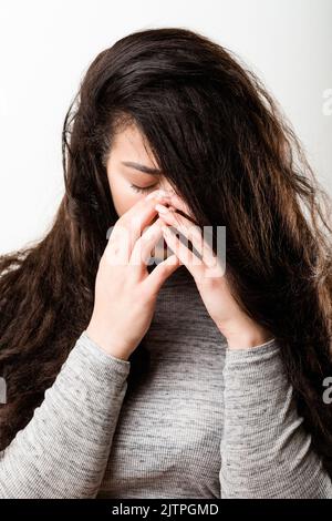 desperate hopeless lonely upset emotional girl Stock Photo