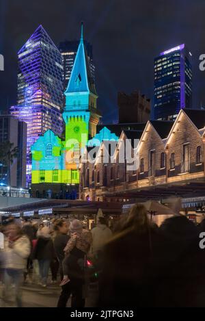 Created by Luca French and Spinifex Group, Ninget Universe colourfully lights the heritage Australian Steam Navigation Co. building during Vivid 2022 Stock Photo