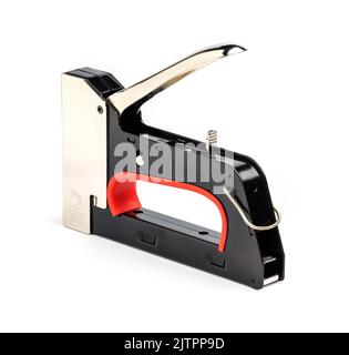 Staple gun isolated on white background. Heavy-duty steel staple gun to repairs around your home. Stock Photo