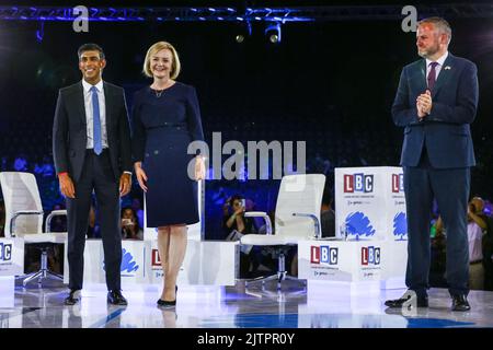 London, UK. 31st Aug, 2022. Left to right: Rishi Sunak, Liz Truss, candidates, Andrew Stephenson, Chairman Conservative PartyThe final hustings in the Conservative Party leadership race, held at Wembley Arena, sees Liz Truss and Rishi Sunak compete to lead the party and become the next Prime Minister. Credit: Imageplotter/Alamy Live News Stock Photo