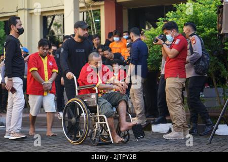 Makassar, South Sulawesi, Indonesia. 1st Sep, 2022. The suspects in the crime case resulted from the disclosure of criminal cases for three weeks in an operation called OPERASI SIKAT which was carried out by the South Sulawesi Regional Police in Makassar City, Gowa Regency and Maros Regency. Dozens of crime suspects and evidence were successfully secured and presented at a press conference held at the South Sulawesi Police Headquarters, Wednesday, September 1, 2022. The cases revealed were robbery, theft, and crimes of assault using arrows. (Credit Image: © Herwin Bahar/Pacific Press via Z Stock Photo