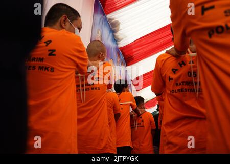 Makassar, South Sulawesi, Indonesia. 1st Sep, 2022. The suspects in the crime case resulted from the disclosure of criminal cases for three weeks in an operation called OPERASI SIKAT which was carried out by the South Sulawesi Regional Police in Makassar City, Gowa Regency and Maros Regency. Dozens of crime suspects and evidence were successfully secured and presented at a press conference held at the South Sulawesi Police Headquarters, Wednesday, September 1, 2022. The cases revealed were robbery, theft, and crimes of assault using arrows. (Credit Image: © Herwin Bahar/Pacific Press via Z Stock Photo