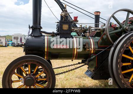 West Bay.Dorset.United Kingdom.June 12th 2022.A miniature Burrell traction engine is on display at the West Bay vintage rally Stock Photo