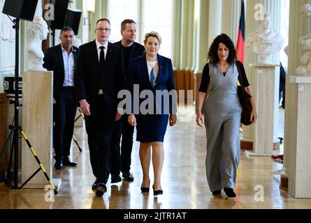 01 September 2022, Berlin: Franziska Giffey (2nd from right, SPD), Governing Mayor of Berlin, together with Dennis Buchner (l-r, SPD), President of the Berlin House of Representatives, Klaus Lederer (Die Linke), Berlin Senator for Culture and Europe, and Bettina Jarasch (Bündnis 90/Die Grünen), Berlin Senator for the Environment, Transport, Climate and Consumer Protection, leave the Hall of Columns in the Rotes Rathaus after signing the book of condolence for the late honorary citizen of Berlin, Mikhail S. Gorbachev. Nobel Peace Prize laureate and former Soviet leader Gorbachev died in Moscow Stock Photo