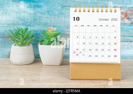 October 2022 Monthly desk calendar for 2022 year with plant pot. Stock Photo