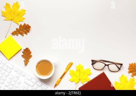 Top view autumn desktop keyboard coffee cup book glasses Stock Photo