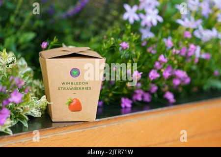 Wimbledon Strawberry box around the grounds at The Championships 2022. Held at The All England Lawn Tennis Club, Wimbledon. Stock Photo