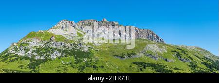 Red Wall at Formarinsee in the Lechquellen Mountains Stock Photo