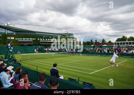 General Views of Maxamillion Marterer and Aljaz Bedene on Court 8 at The Championships 2022. Held at The All England Lawn Tennis Club, Wimbledon. Stock Photo