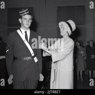 1965 The Boys Brigade BB the Queens Badge being placed on the