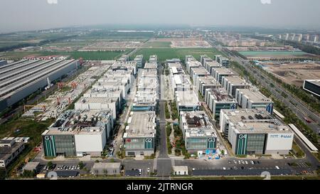 Beijing, China. 20th Aug, 2022. Aerial photo taken on Aug. 20, 2022 shows a view of Lingang new area of the China (Shanghai) Pilot Free Trade Zone in east China's Shanghai. Credit: Jin Liwang/Xinhua/Alamy Live News Stock Photo