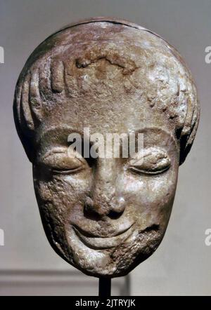 Head of a Kouros, Found sanctuary of Ptoan, Apollo in Boeotia,   National Archaeological Museum in Athens, about 550 BC, Naxian Marble , Stock Photo