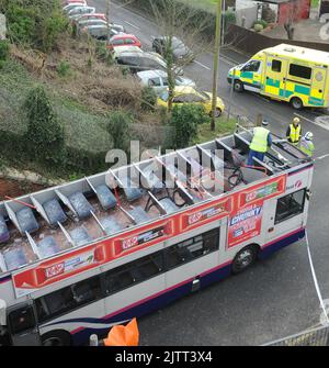 A DOUBLE DECKER BUS HAD ITS ROOF RIPPED COMPLETELY OFF AFTER IT ...