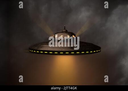 An unidentified flying object (UFO) against a moody sky. Lightrays visible. Slight motion unsharpness (halo). 3d render Stock Photo