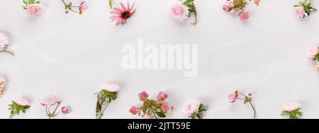 Autumn creative composition roses, hydrangea flowers on gray background. Fall, autumn background. Flat lay, top view, copy space Stock Photo
