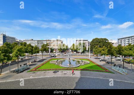 Mannheim, Germany - September 2022: Public park with fountain and flowers in city center of Mannheim called 'Friedrichsplatz' Stock Photo