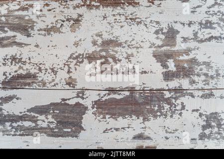Vintage white painted oak, scratched, aged and paint peeling off from wood. High quality texture and background for your projects and creative work Stock Photo