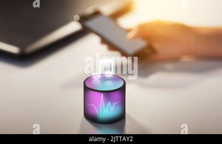 smart speaker with virtual music note hologram Stock Photo