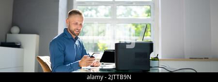 Wireless Print On Printer Using Mobile Phone Stock Photo