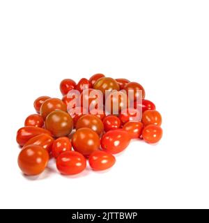 Various mini tomatoes against a white background Stock Photo