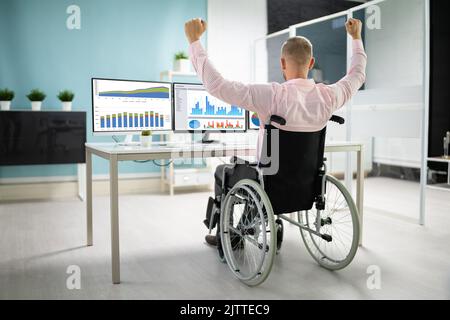 Excited Business Data Analyst Man Celebrating Win Stock Photo