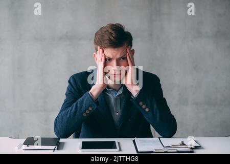 office routine deadlines stressed young manager Stock Photo